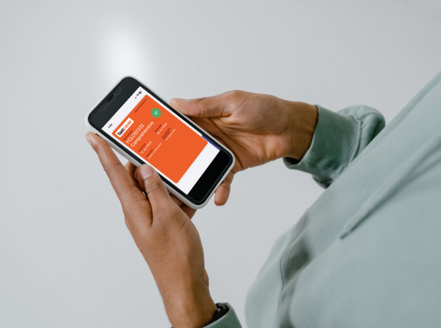 person using fast cover website on mobile phone